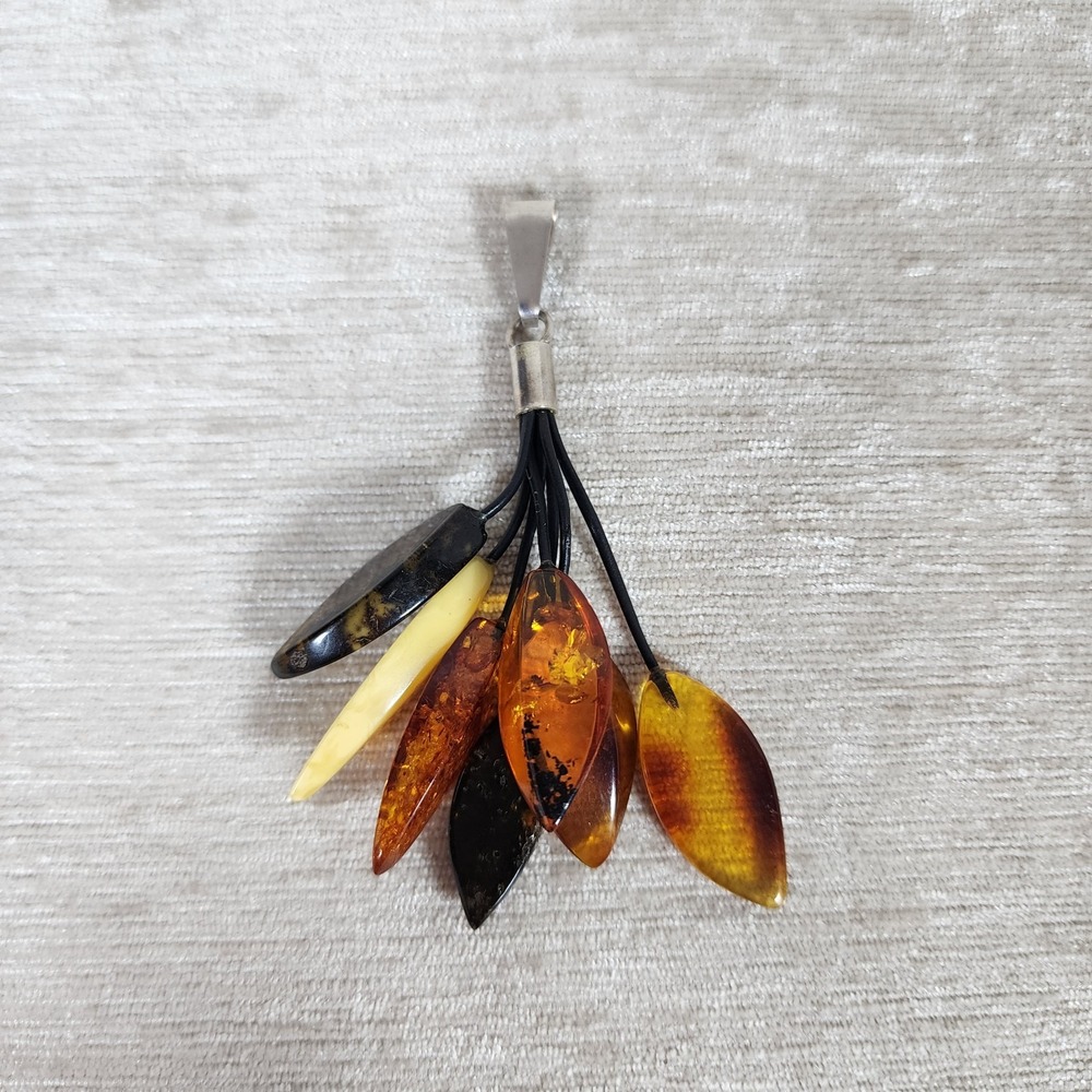 Baltic amber pendant with multiple leaf-shaped stones in various colors 2.7"